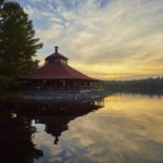Arowhon dining room with high cupola over the lake at sunset