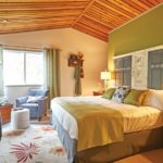 Sage green with blue accents in Arowhon Pines suite