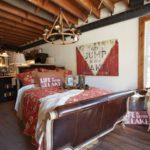 Warm cottage bedroom designed by HillTop