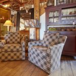 Plaid chairs with oversized cushions